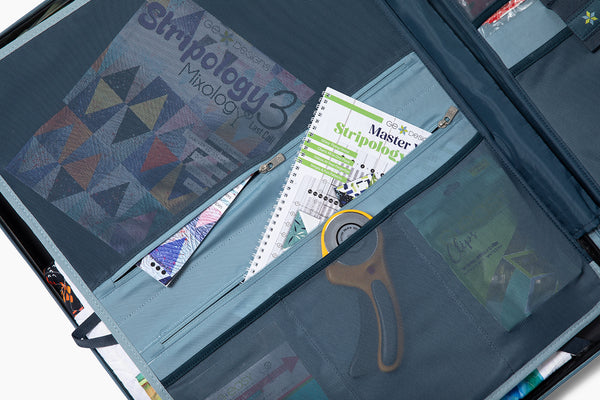 Zip mesh pockets for books, patterns and your cutter.
